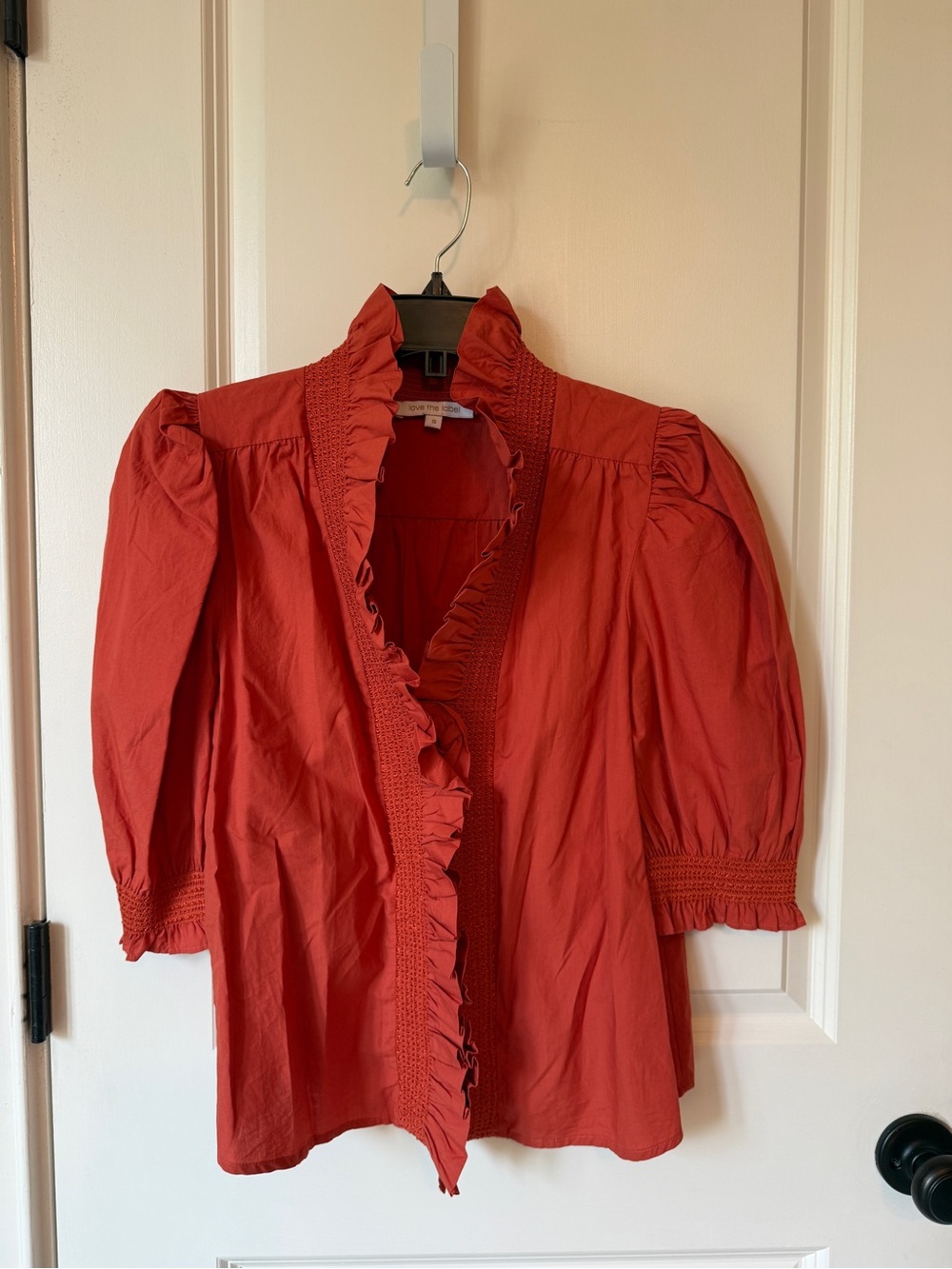 Love the Label Ruffled V-Neck Puff Sleeve Blouse in Rust
